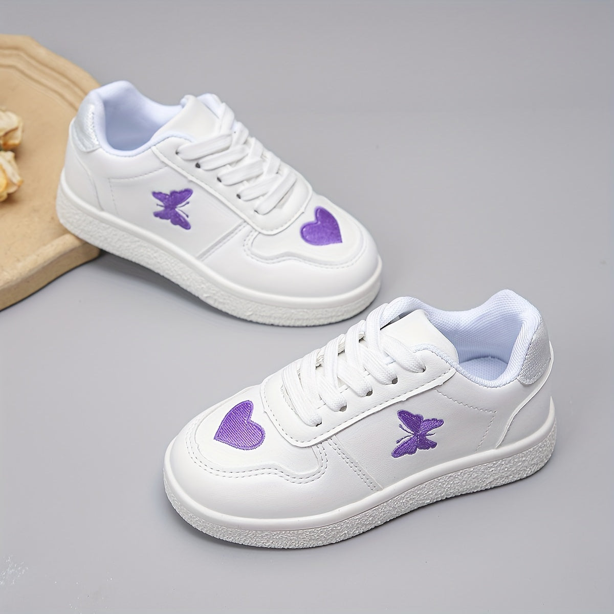 The New White Sneakers Are Versatile, Featuring Hearts And Butterflies.