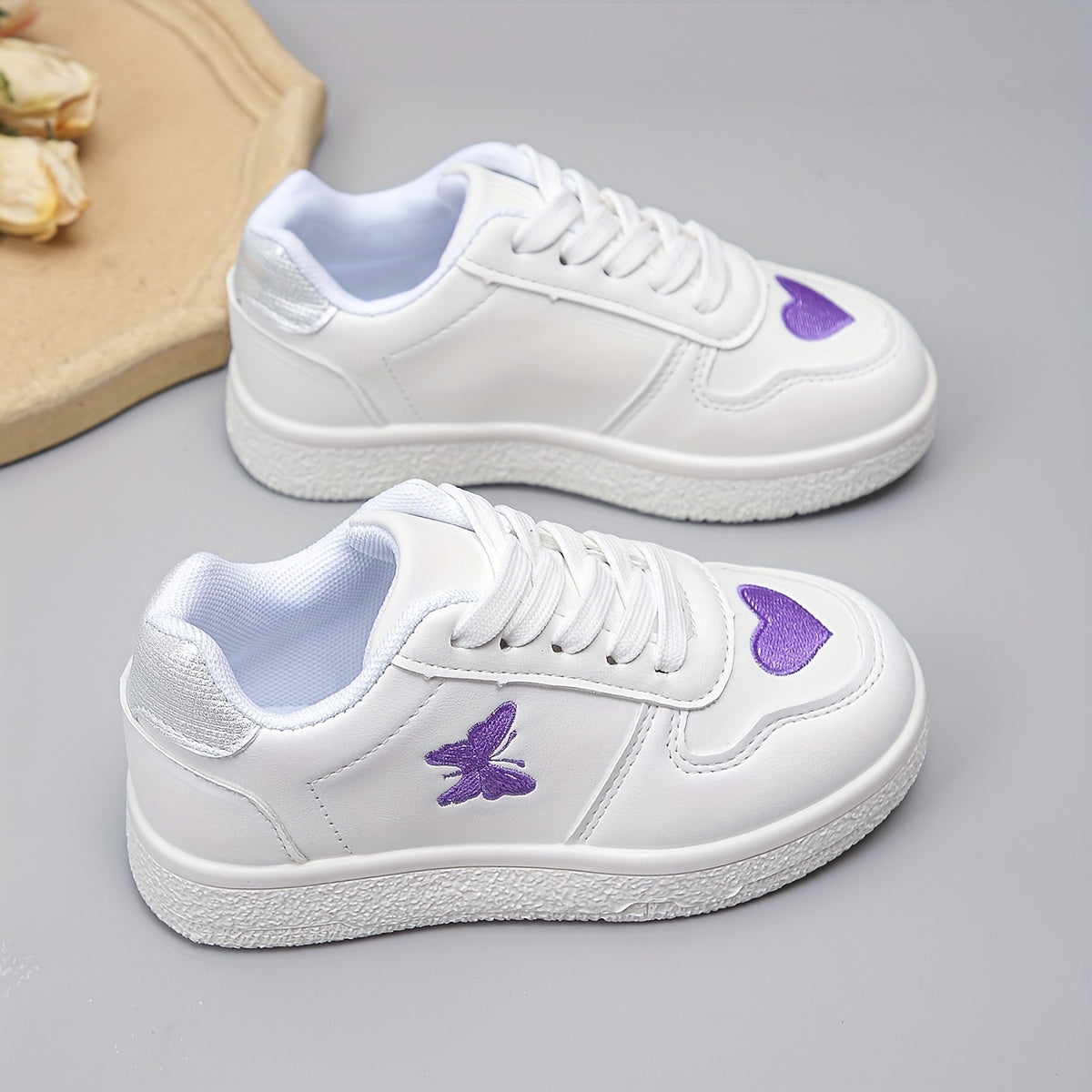 The New White Sneakers Are Versatile, Featuring Hearts And Butterflies.