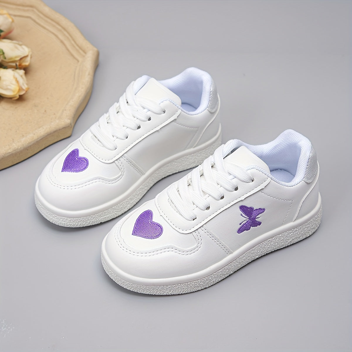 The New White Sneakers Are Versatile, Featuring Hearts And Butterflies.