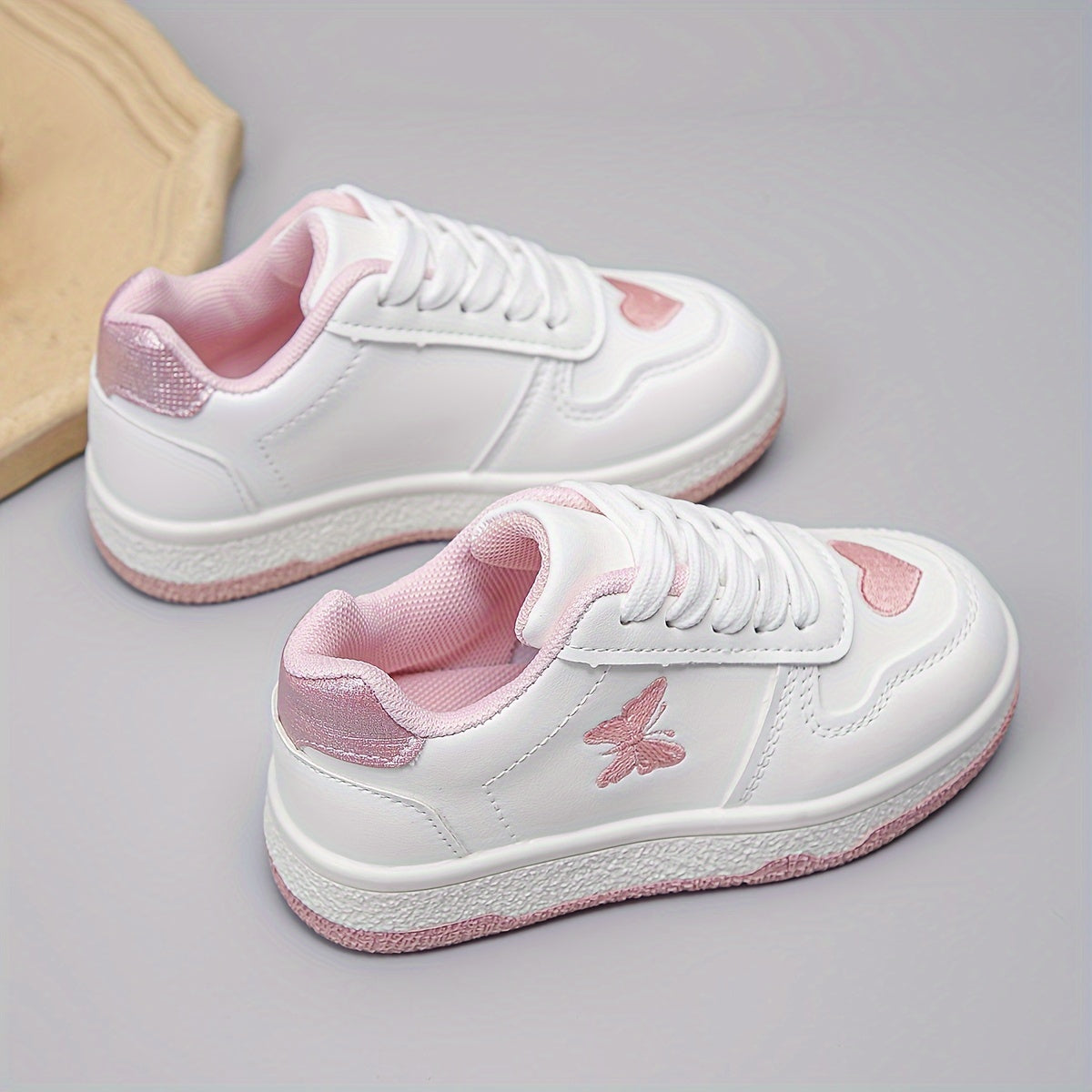 The New White Sneakers Are Versatile, Featuring Hearts And Butterflies.